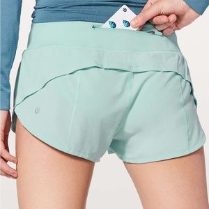 Lightly worn teal lulu lemon speed up shorts SIZE 2